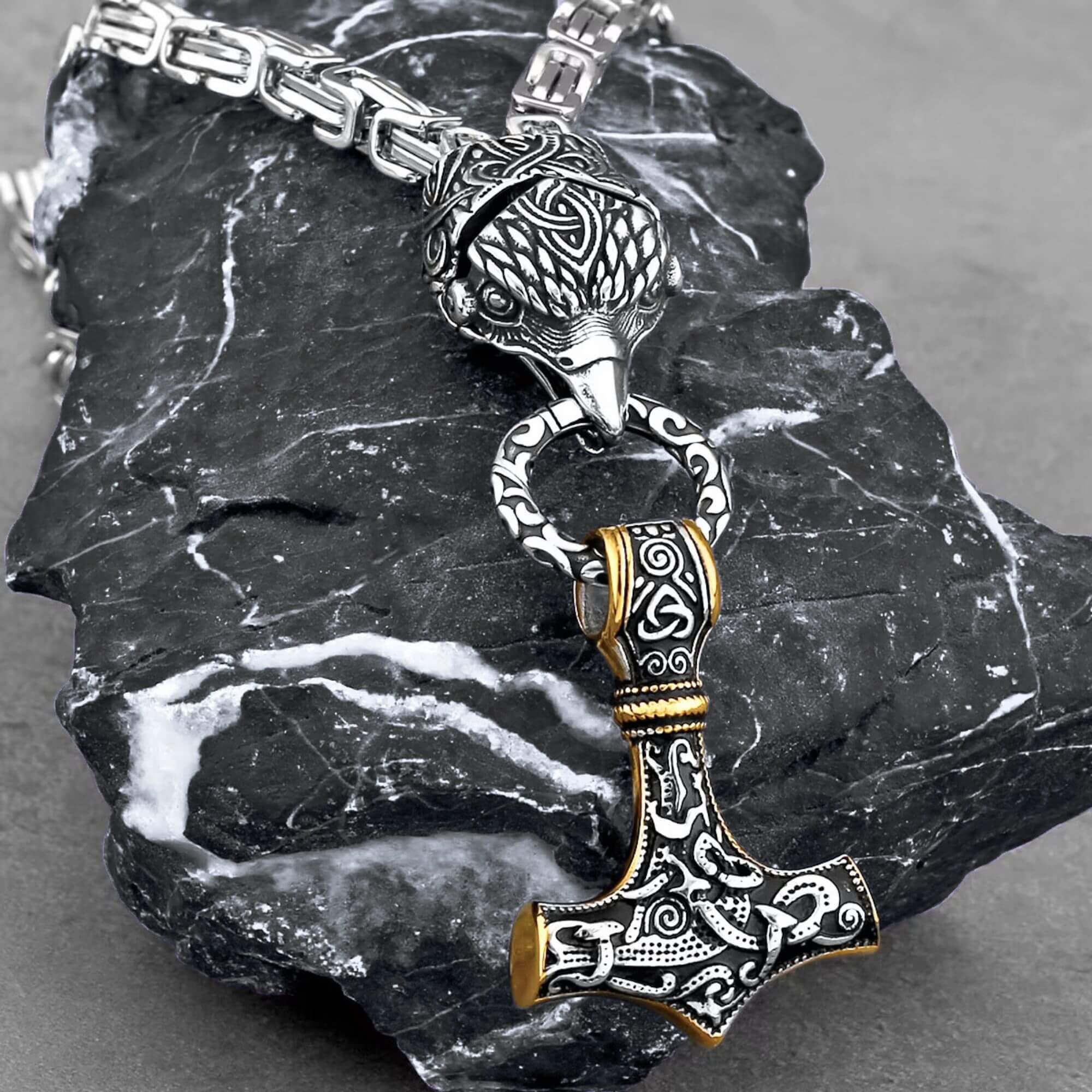 Hræsvelgr Holding Mjolnir Necklace