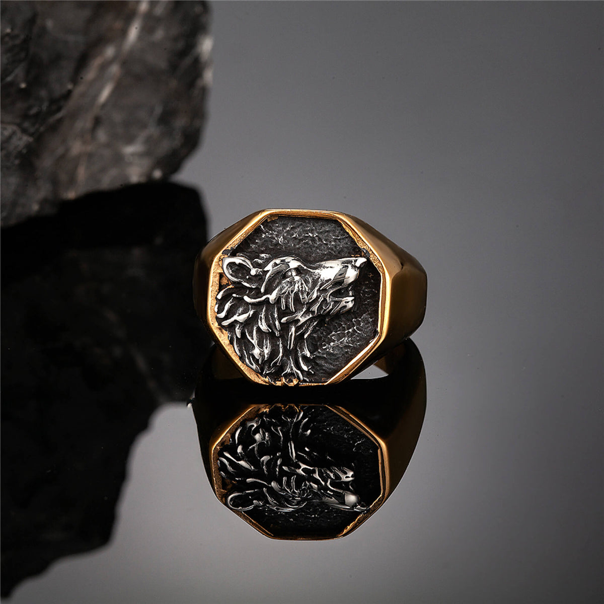 https://odinstreasures.com/cdn/shop/files/odins-treasures_golden-norse-wolf-ring_01_1200x.jpg?v=1689325657