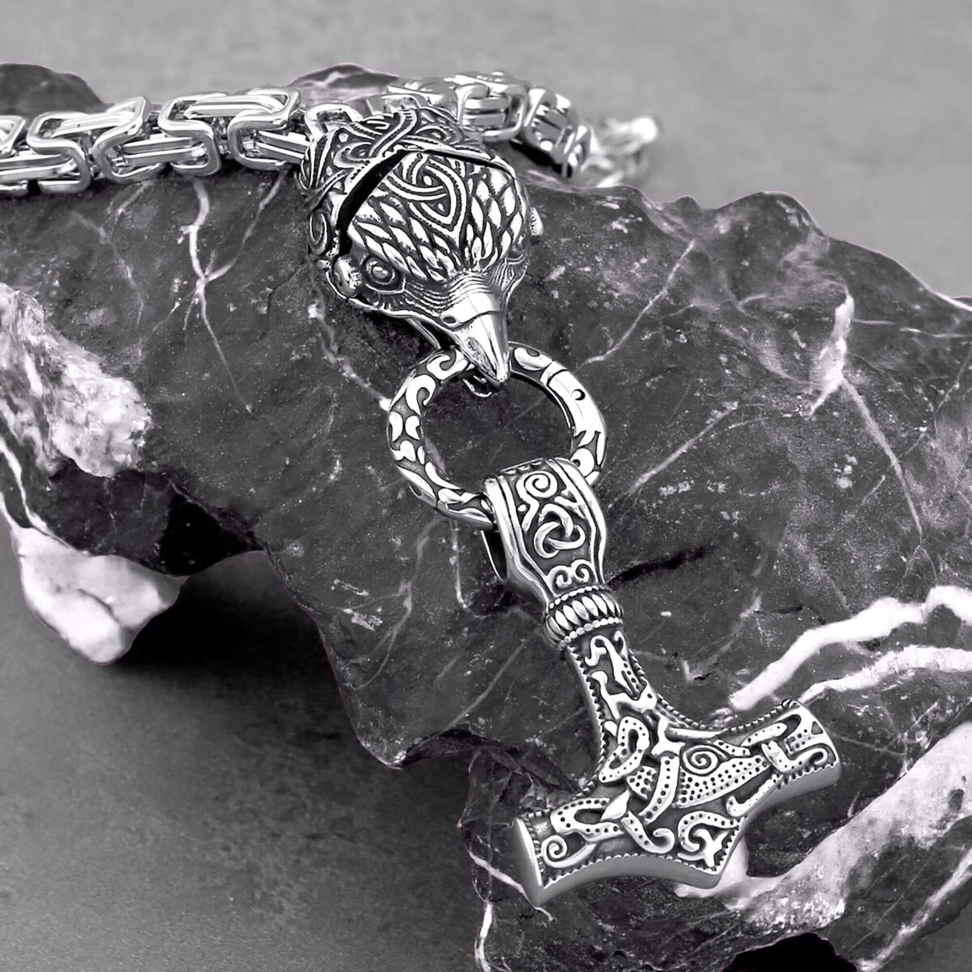 Hræsvelgr Holding Mjolnir Necklace